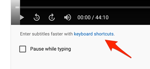 An arrow points at a link called Keyboard shortcuts.