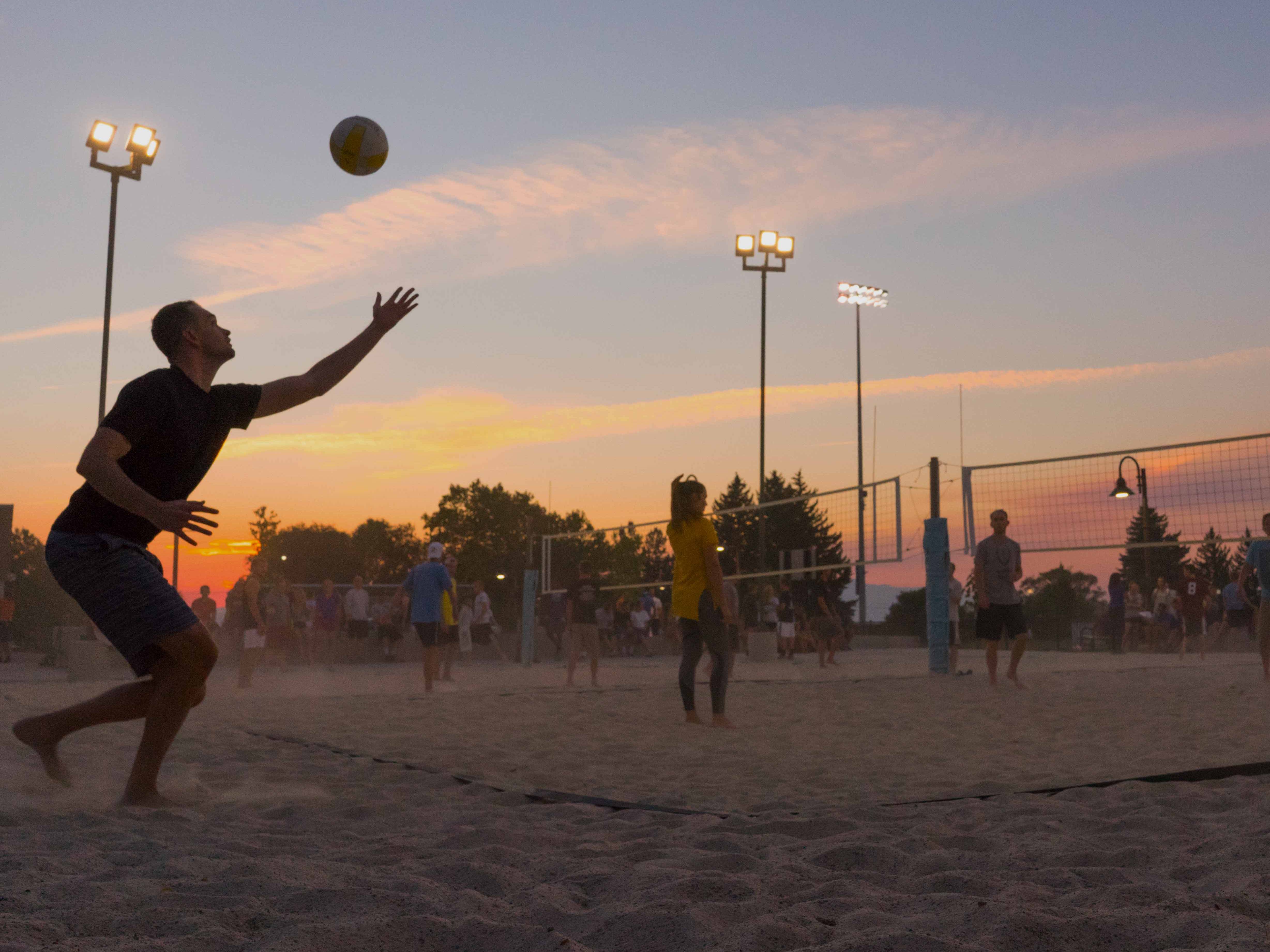 sand volleyball at sunset