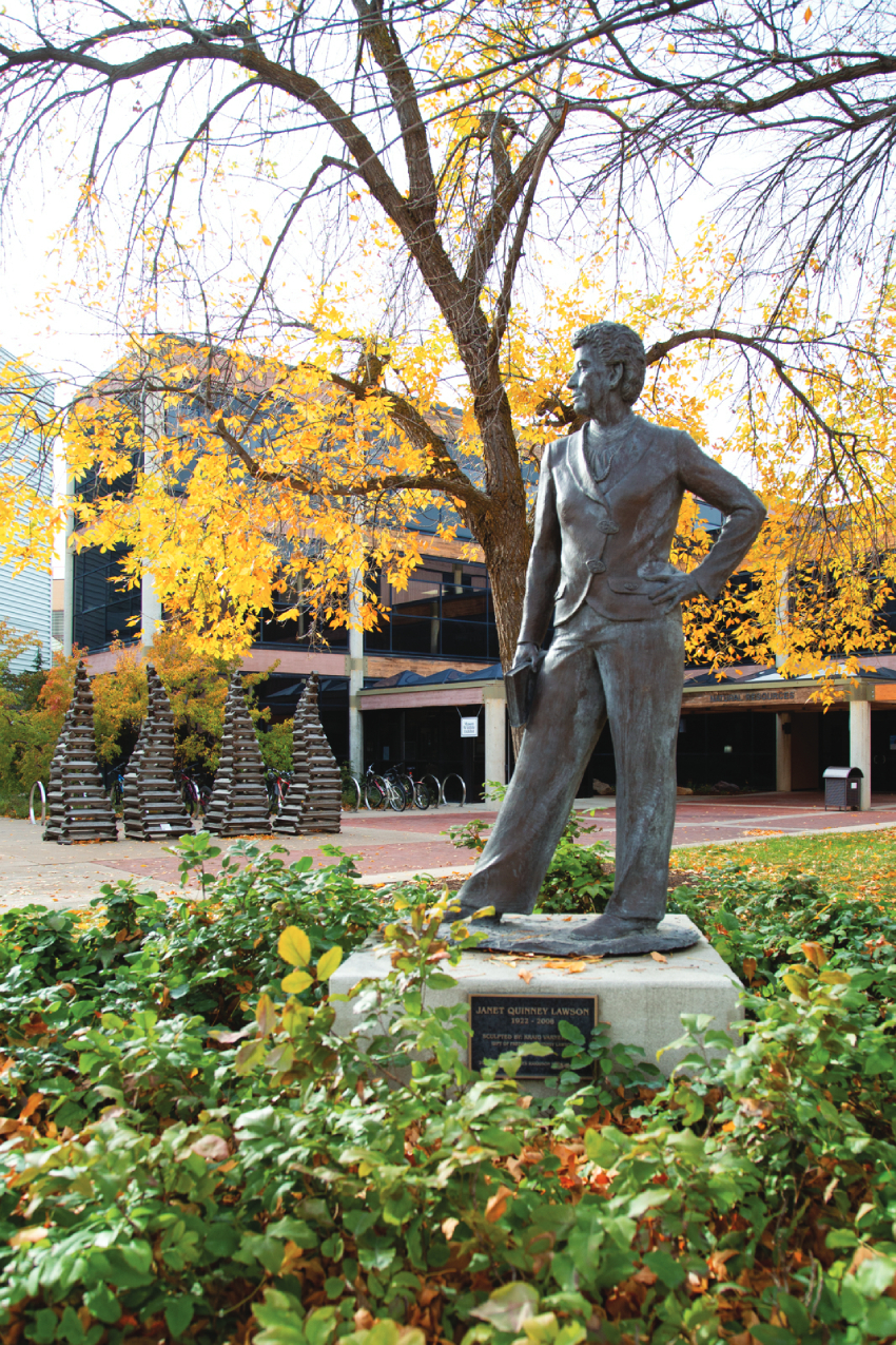 Janet Quinney Lawson bronze statue in front of the QCNR building on USU's Logan campus