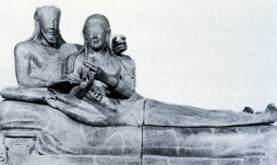 Etruscan statue: Tomb of a husband and wife embracing (click to see larger image)