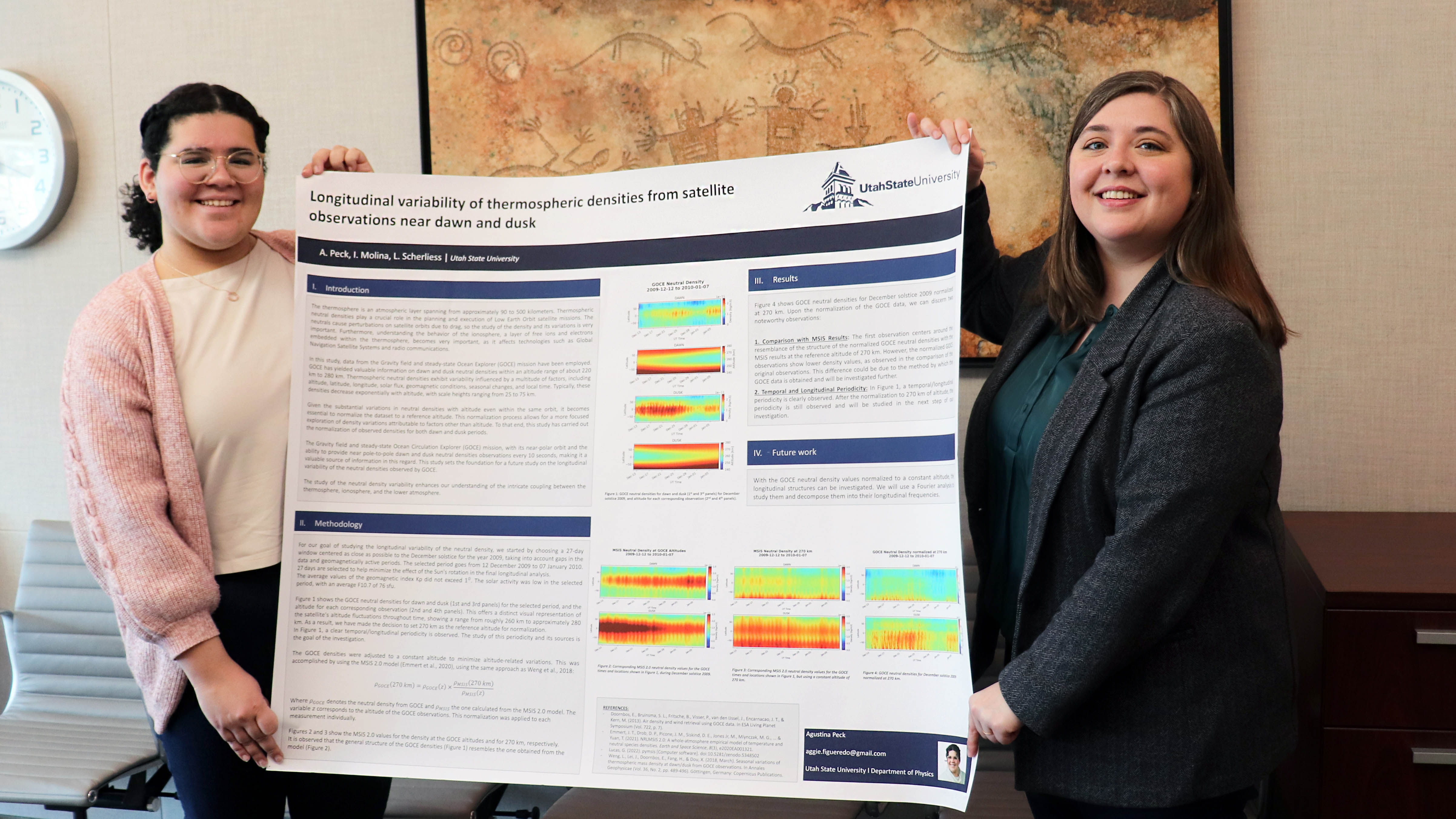 USU physics and math scholar Aggie Peck, left, a 2023 UASAL Summer Fellow, and her postdoctoral mentor Ivana Molina, right, display a research poster Peck presents during USU Research Week 2024's Student Research Symposium
