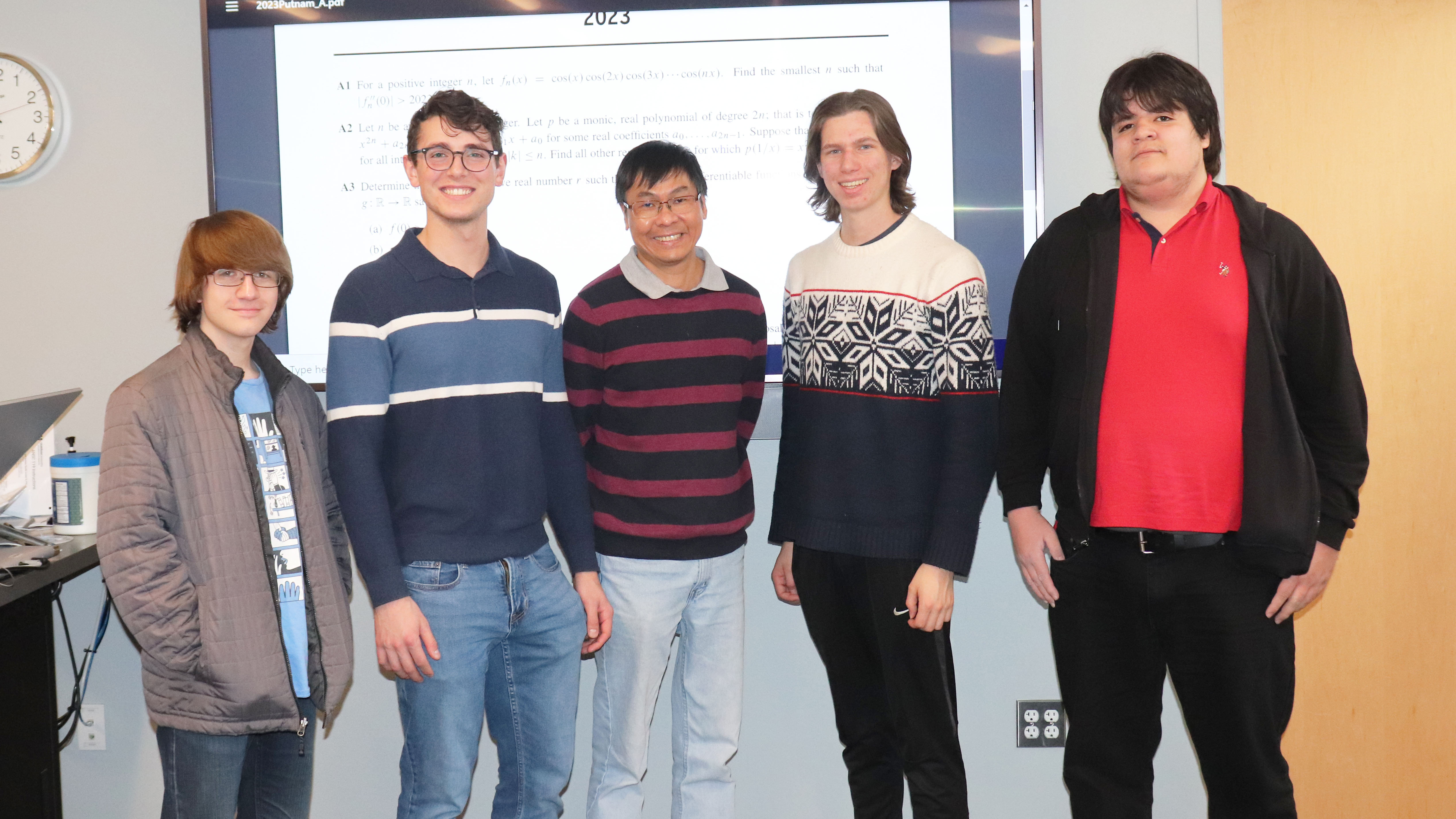 From left, USU Putnam Mathematics Competition team members Jason Atwood, Hyrum Cooper, USU faculty mentor Nghiem Nguyen, Carter Green and Brian Armenta. Additional team members are Cole Neiderman and Emily Wessman.