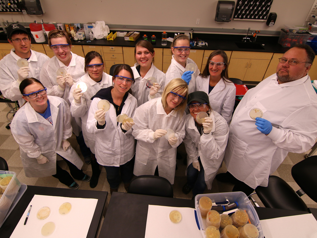 Lianna Etchberger with students in the lab