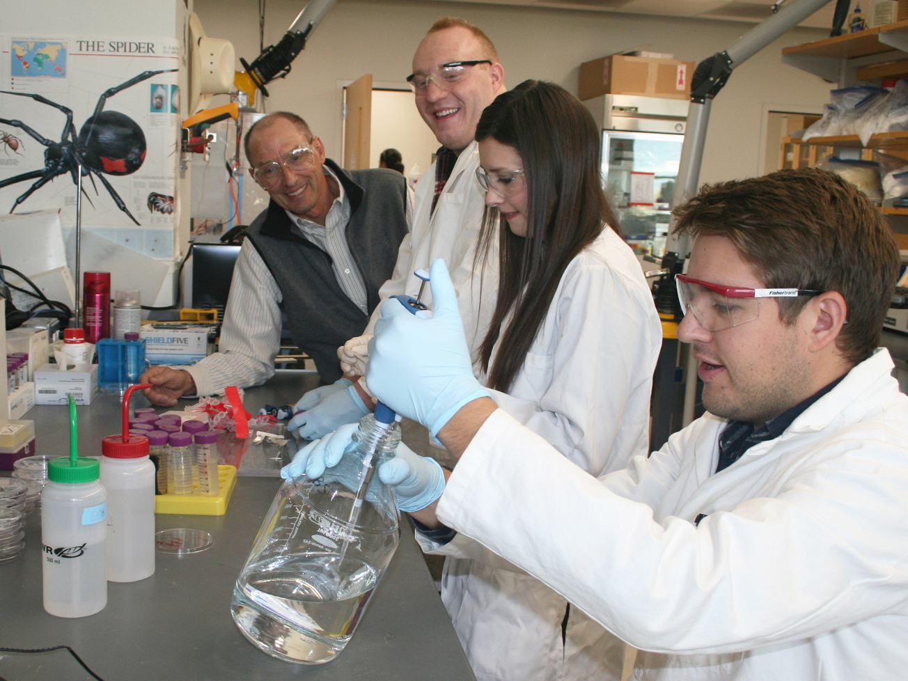 Dr. Randy Lewis in the lab with researchers