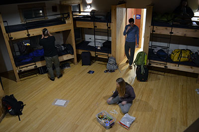 students and bunks in cabin
