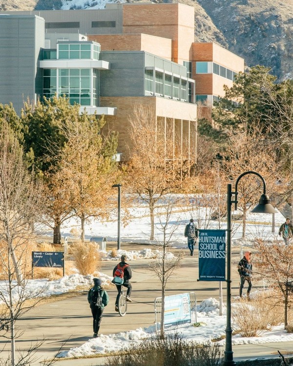 Students walk the sidewalk during a January morning